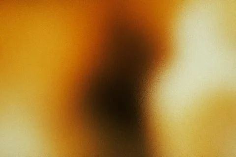 Abstract warm gold texture background with blurred light Stock Photos