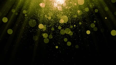 Abstract warm light beam illuminates falling golden glitter dust particles Stock Footage 327597825