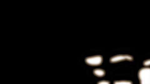 Abstract warm light shapes forming against dark background with cinematic m.. Video stock 344287957