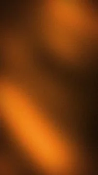 Abstract warm orange grainy texture dark brown black vertical digital backg.. Stock Photos