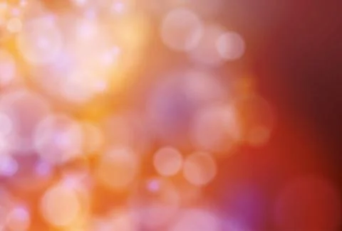 Abstract warm red orange bokeh background. Festive defocused lights. Illustrazione stock