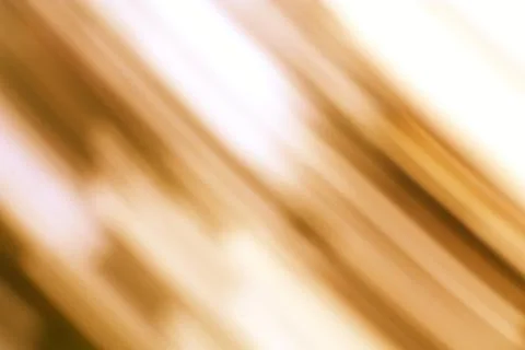 Abstract Warm Tones Gradient Motion Blur Background with Subtle Diagonal St.. Stock Photos