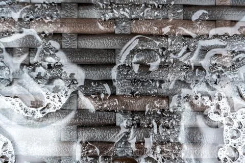 Abstract Water and Foam Pattern on Tiled Surface Stock Photos