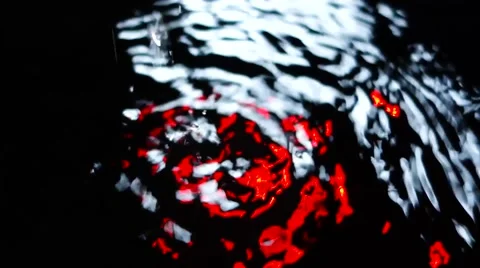 Abstract water like background. Red lights reflected on the water. Stock Footage 61746408