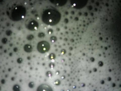 Abstract water with bubbles background with different elements in a blur effe Stock Photos