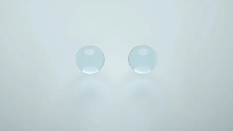 Abstract water drop splitting in two and rejoining.Motion graphics design. Vidéo 168206970