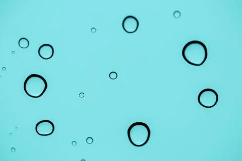 Abstract water drops on plain background, shallow depth of field Stock Photos