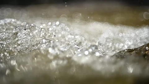 Abstract water figures and drops in summer sunlight (slow motion, bokeh) Stock-Footage 219641060