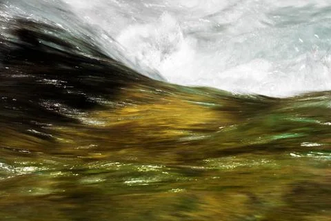 Abstract Water Flow with Motion Blur and Vivid Colors Stock Photos