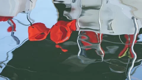 Abstract water reflection of a boat with life jackets Stock Footage 339048123