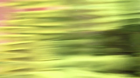 Abstract water surface background Wave and ripples Yellow Red Green Purple Vidéo 122284389