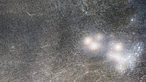 Abstract water surface from the pool reflects the sunlight. Stock Footage 193689531