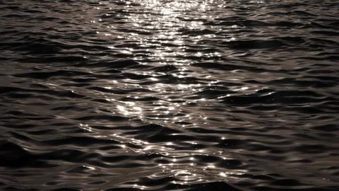 Abstract Water Surface with Sunlight Reflection Pattern Stock Photos