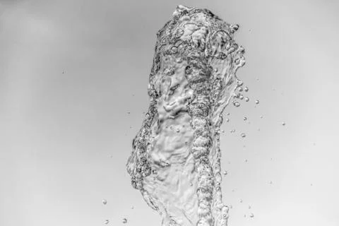 Abstract water wave drop in motion with color background. Stock Photos