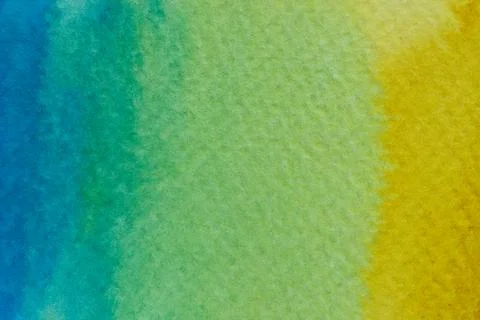 Abstract watercolor background with a smooth gradient yellow, green and blue Stock Photos