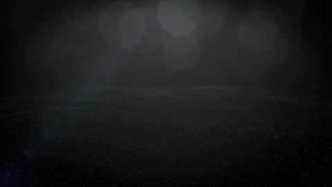 Abstract waves from tiny particles moving on the dark grey background. Textures Stock-Footage 100273650