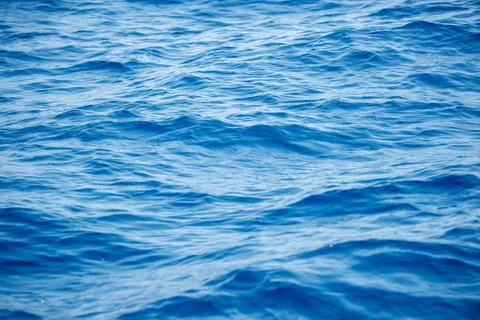 Abstract wavy blue water background Stock Photos