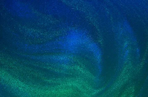 Abstract wavy overflows of liquid with glitter. Fotos de archivo
