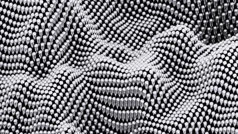 Abstract wavy texture of grey small balls. Design. Tiny metal beads moving up Illustrazione stock