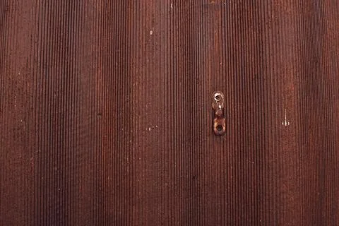Abstract weathered rusty red and brown corrugated background Stock Photos