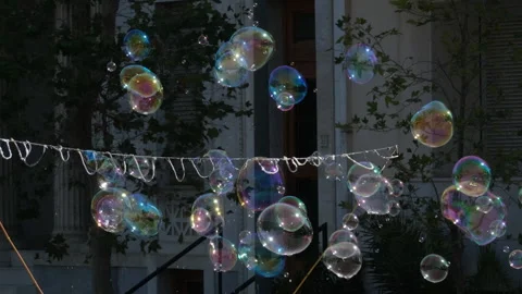 Abstract white background with soap bubbles, pubblic entertainment. Slow motion Stock Footage 301433528