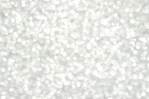 Abstract white bokeh background, defocused blurry sparkles. Stock Photos