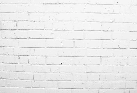 Abstract white brick wall texture depicting in paint colors on an old brick wall Photos