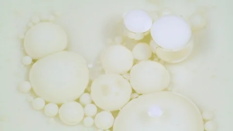 Abstract white bubbles paint. Slow motion. Top view Stock Footage 105174515