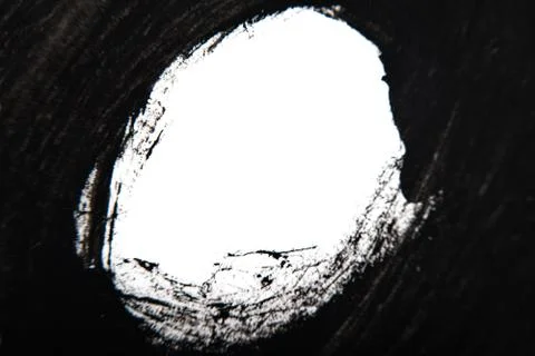 Abstract white circle in a frame of black gouache Foto stock