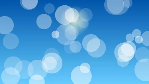 Abstract white circles floating slowly against vivid blue sky background mo.. Stock Footage 341850859