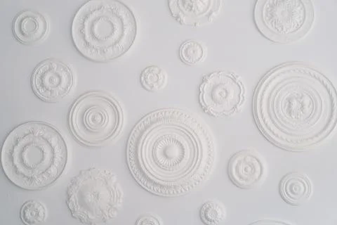 Abstract White Circular Bas-Relief Sculptures on a Clean Background Stock Photos