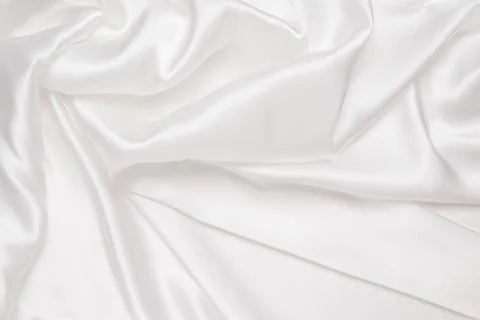Abstract white fabric texture background. Cloth soft wave. Stock Photos