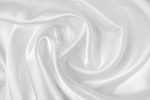 Abstract white fabric texture background. Cloth soft wave. Creases of satin,  Stock Photos