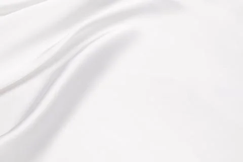 Abstract white fabric texture background. Cloth soft wave. Creases of satin,  Stock Photos
