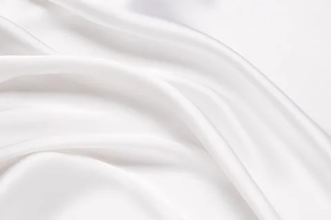 Abstract white fabric texture background. Cloth soft wave. Creases of satin.. Foto stock