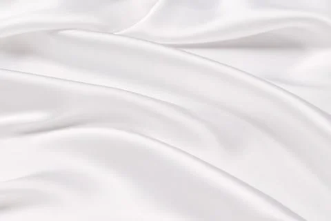 Abstract white fabric texture background. Cloth soft wave. Creases of satin.. Stock Photos