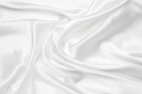 Abstract white fabric texture background. Cloth soft wave. Creases of satin.. Stock Photos