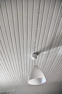 Abstract white interior with a lamp Stock Photos