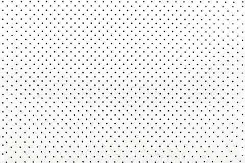 Abstract white light background with many lots of holes polka dot close-up Stock Photos