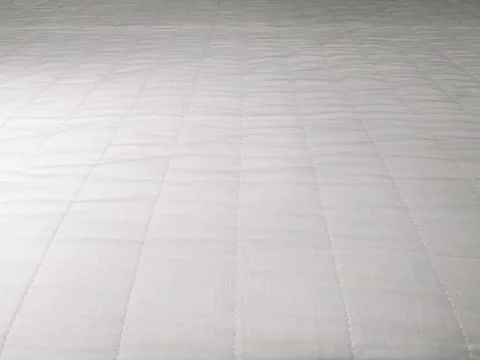 Abstract white mattress bedding texture background close up Stock Photos