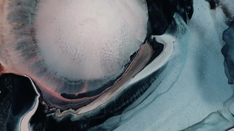 Abstract White Paint Exploding Slowly In Multicolored Surface Background. Stock Footage 249048065