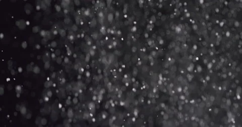Abstract white particles against the black background, rain, powder, RED camera Stock Footage 133847516