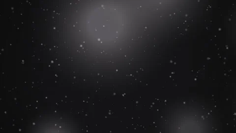 Abstract white particles drift against a dark background, creating a sense of Stock Footage 326997618