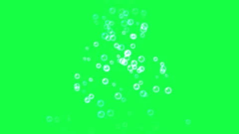 Abstract white particles gently floating against a vibrant green and black .. Stock Footage 345619956
