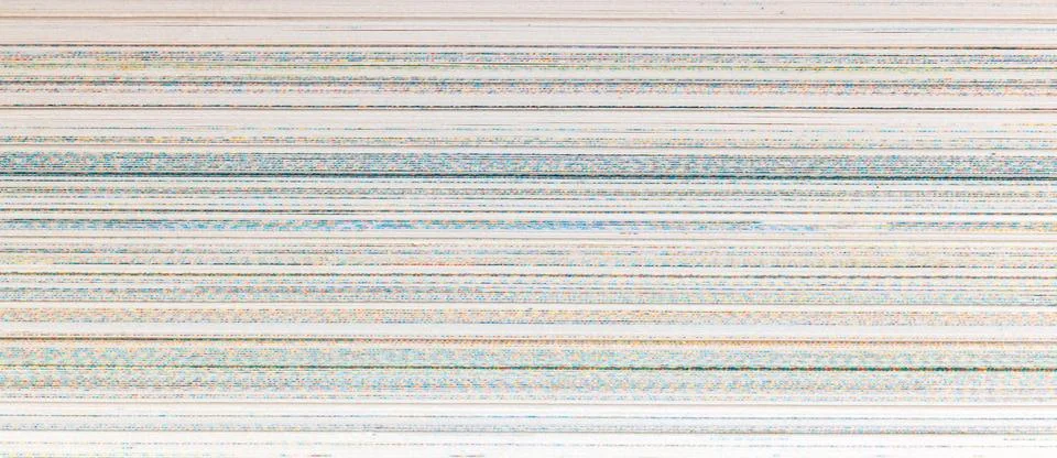Abstract white pattern of intertwined thin lines with subtle color variations Foto stock