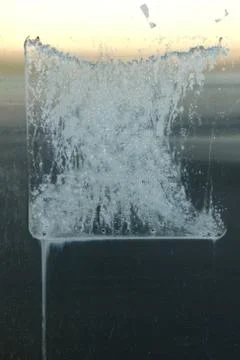 Abstract white shape on metal Stock Photos