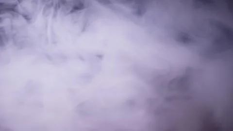 Abstract White Smoke Billowing and Flowing Slowly on a Black Background Stock Footage 330114437