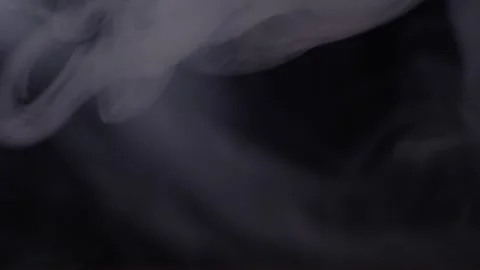 Abstract White Smoke Drifting Slowly Against Dark Black Background 库存影片 330115799