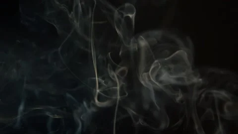 Abstract white smoke in slow motion. Smoke, a cloud of cold fog on a black backg Stock Footage 149338579
