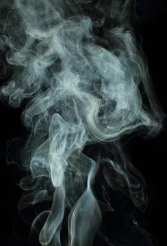 Abstract white smoke texture on black background Stock Photos